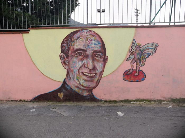 Un murales raffigurante il volto del Beato Giuseppe Puglisi a Brancaccio