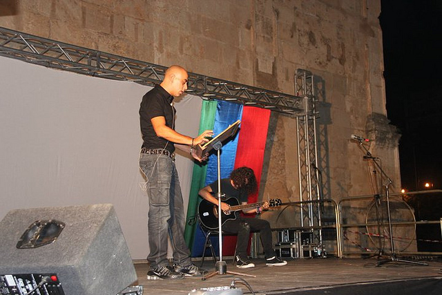 Serata Spettacolo Al Bab: racconto su Padre Puglisi, Scrittura e lettura a cura dei Volontari del Centro Padre Nostro; musica di Nazario Di Liberto