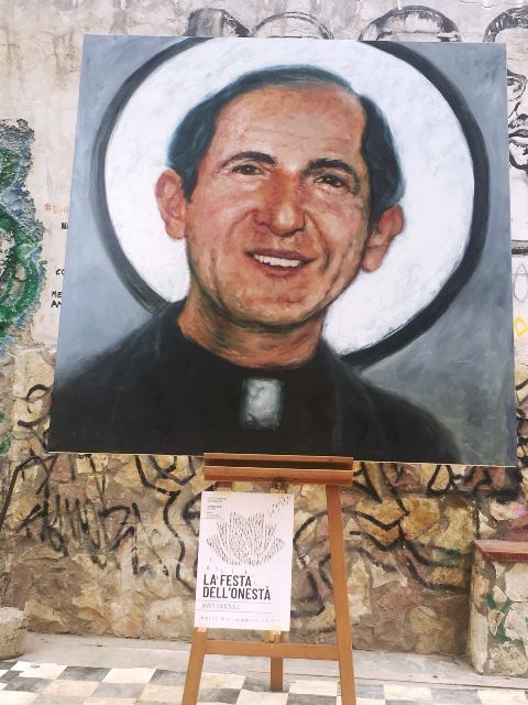 Dipinto raffigurante il Beato Giuseppe Puglisi realizzato dallo Street Artist Igor Palminteri donato dall'ass. Cassaro Alto a Don Enzo Volpe di Santa Chiara