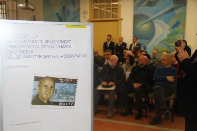 Presentazione del francobollo in memoria del XXV anniversario dell'uccisione di Padre Pino Puglisi, presenti in sala: Pres.  Maurizio Artale del Centro di Accoglienza Padre Nostro (per Padre Puglisi); Antonino Foti -  Capo Area Sicilia; On. Tot� Cordaro ( in rappresentanza del Sindaco); Vicario Episcopale Don Leoluca Pasqua (in rappresentanza dell'Arcivescovo
Lorefice); Assessore Giuseppe Mattina ( in rappresentanza del Sindaco); Dott. Giovanni La Fiura del centro Studi e Documentazione Peppino Impastato
( per Peppino Impastato); Dott. Fabio Gregori (Resp. Filatelia Nazionale); Francesco Puglisi (fratello di Padre Pino Puglisi); Maria Luisa Impastato ( Nipote di Peppino Impastato)
